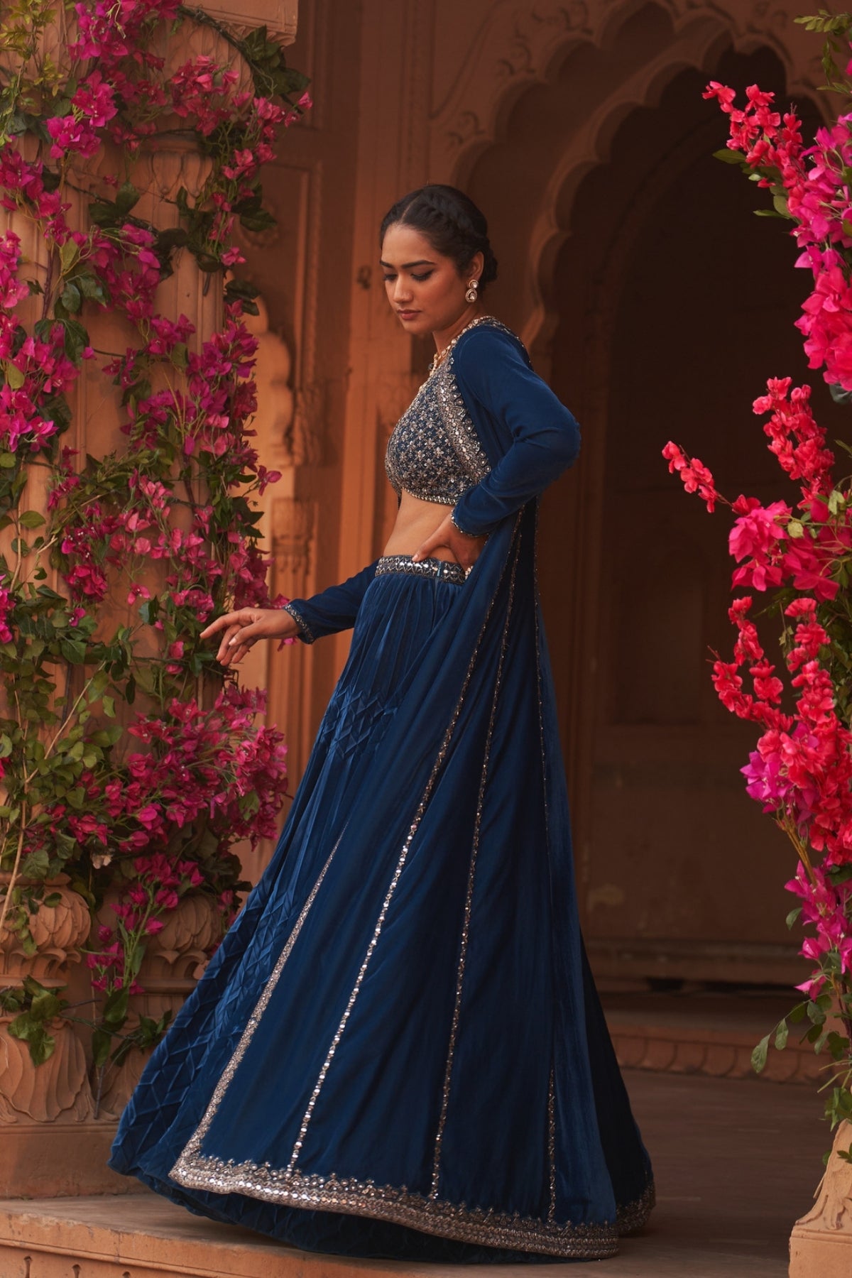 Teal Blue pleated lehenga set with makhmal cape