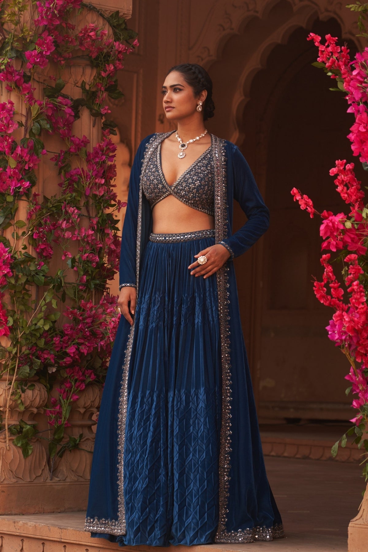 Teal Blue pleated lehenga set with makhmal cape