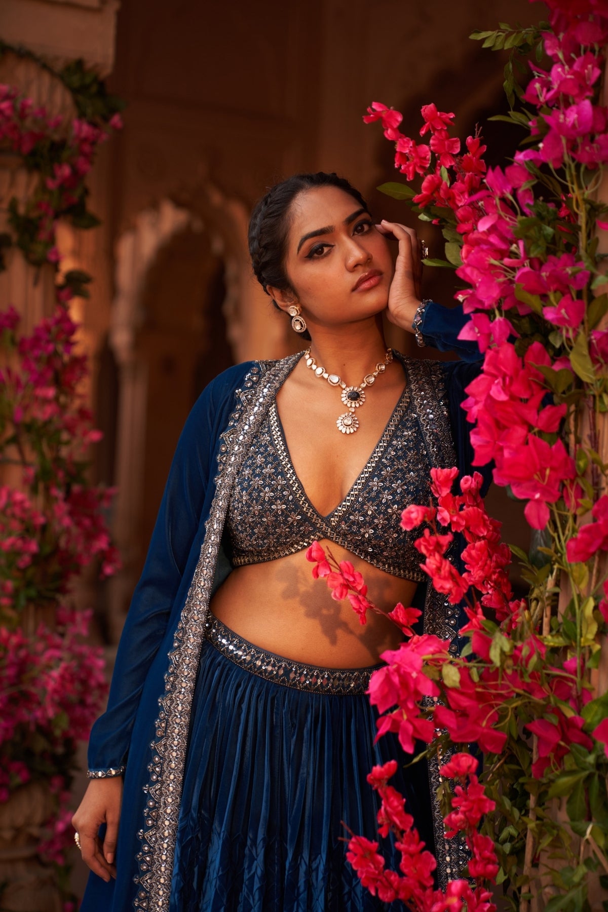 Teal Blue pleated lehenga set with makhmal cape