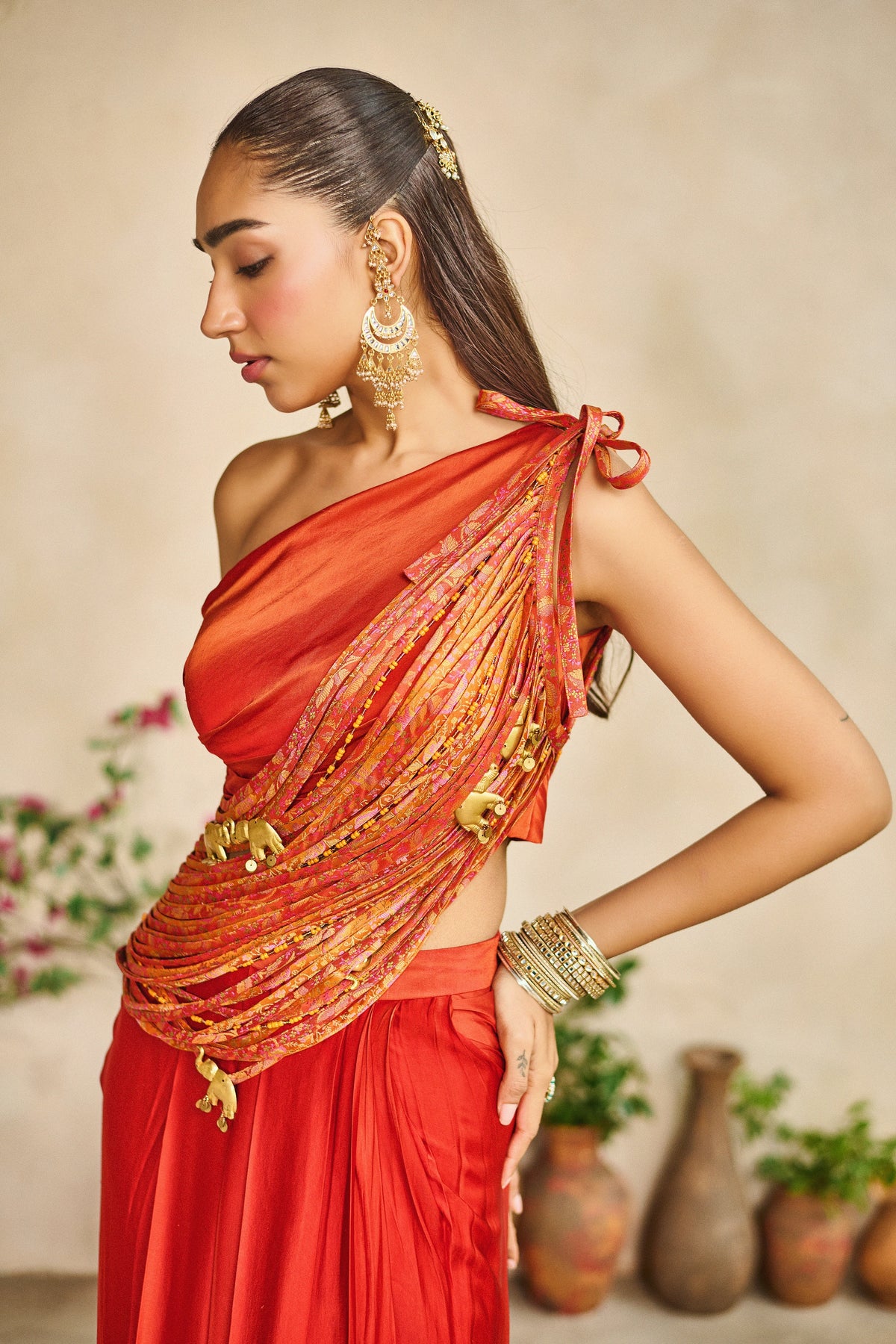 Tesu taar one shoulder sash top lungi skirt set