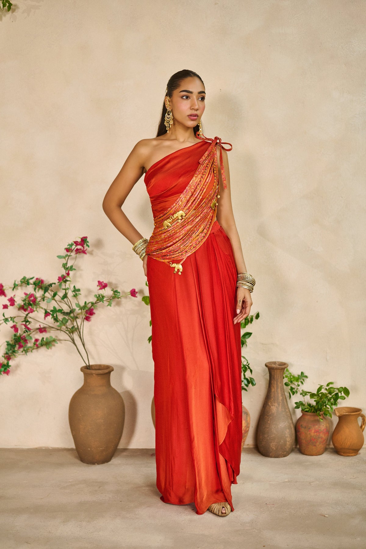 Tesu taar one shoulder sash top lungi skirt set