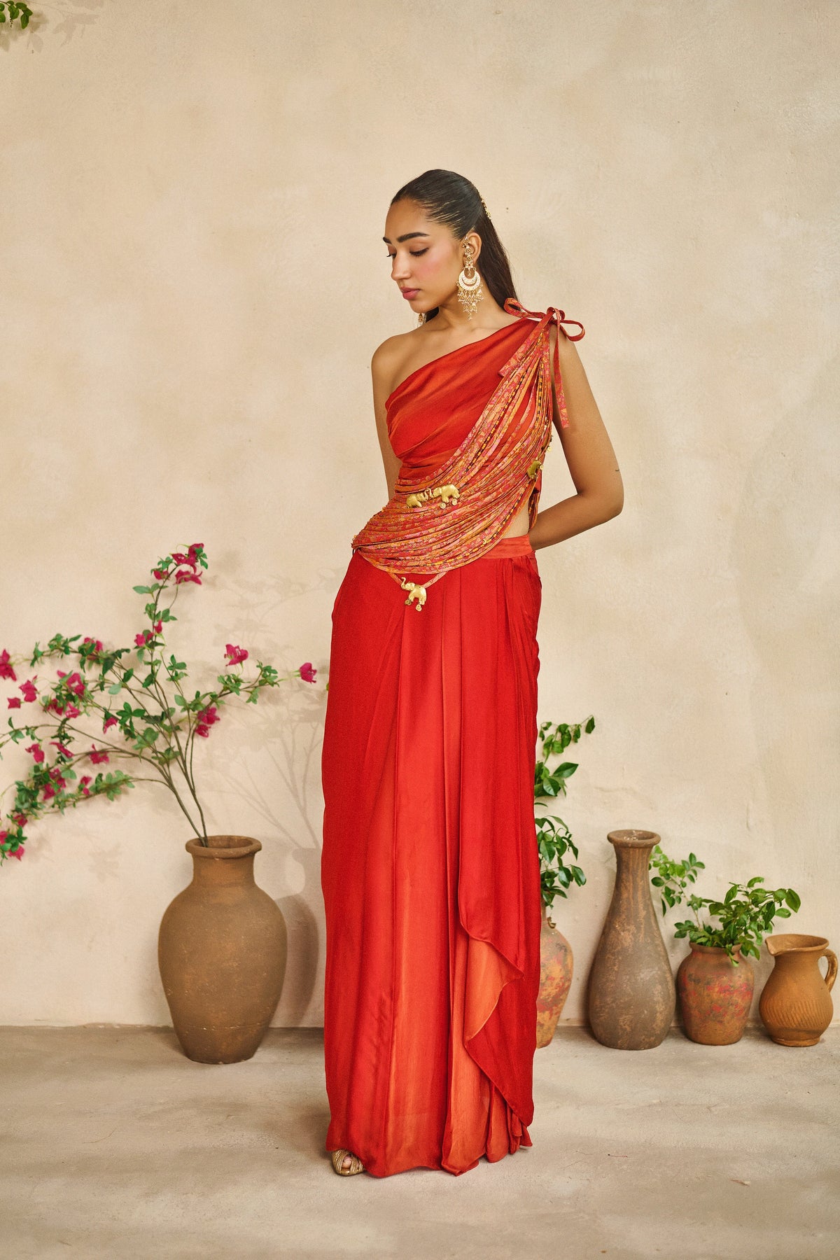 Tesu taar one shoulder sash top lungi skirt set
